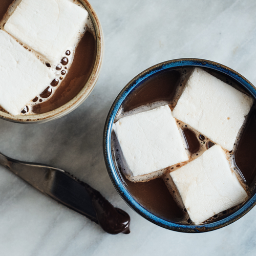 gourmet marshmallows in hot chocolate with spoon 